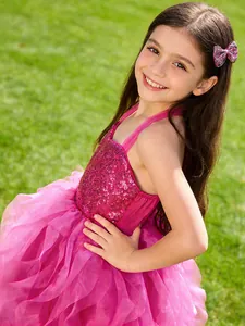 Girl's sparkly pink princess dress with sequin bodice and layered tulle skirt for parties