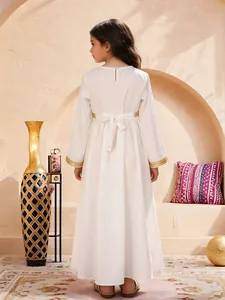 Elegant white long-sleeve girls dress with gold sequin trim and a back bow detail