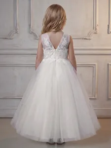 Elegant white lace and tulle flower girl dress with a deep V-back for formal events