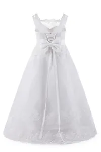 Detailed back view of white flower girl dress with lace-up back and large satin bow
