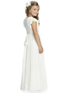 Detail of girls' white chiffon formal dress with ruffled sleeves and back bow tie