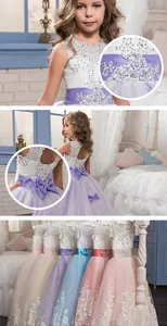 Detail of lace bodice with sequins and large back bow on floral girl princess dress