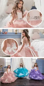Close-up of elegant kids ball gown with lace-up back and large satin bow detail