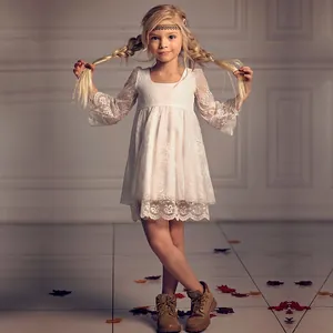 Elegant white lace flower girl dress with long sleeves and floral patterns for parties