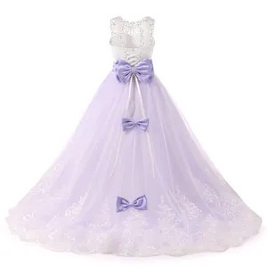 Detail of light purple tulle skirt with white lace embroidery and large back bow