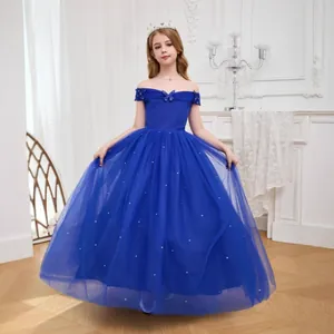 Detail of royal blue off-shoulder flower girl dress with bow and sequin tulle skirt
