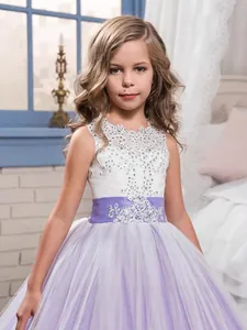 Flower girl princess dress with white sequin bodice and puffy purple mesh skirt