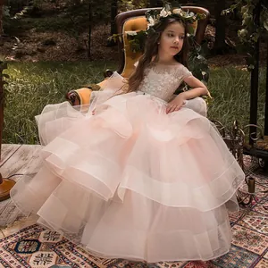 Elegant sleeveless pink flower girl tulle dress with intricate white floral embroidery