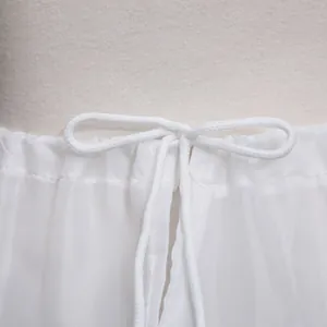 White puffy tulle underskirt with elastic waist and delicate drawstring bow detail
