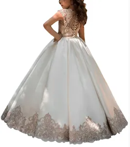 Elegante abito da ballo per bambini color champagne con ricami in pizzo e raso