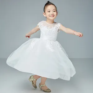 Detailed embroidery and multi-layer mesh tulle on this white girl's princess tutu dress