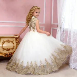 Detailed golden floral embroidery on white layered tulle flower girl princess dress