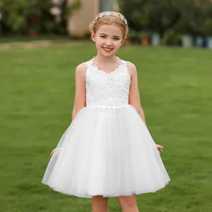 Detailed view of white floral lace bodice and layered tulle skirt for flower girls dress
