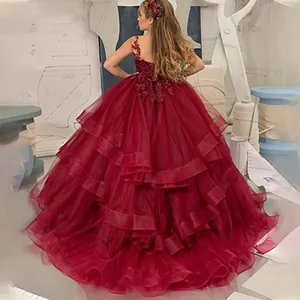 Deep red sleeveless lace girl's ball gown with multilayered tulle skirt and back view