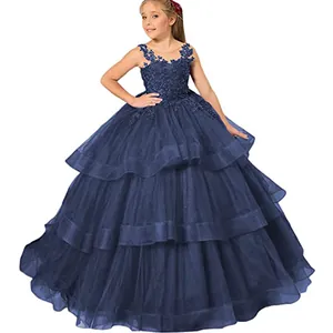 Detail of dark blue girl dress with sleeveless lace bodice and layered tulle cake skirt