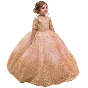 Abito da damigella oro rosa con ricami dorati e gonna in tulle multistrato a sbuffo