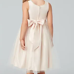 Robe de demoiselle d'honneur champagne rose avec nœud arrière et col en perles