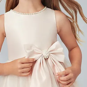 Élégante robe de princesse sans manches rose champagne pour filles avec perles et nœud