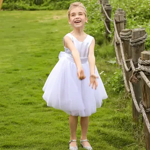 White sleeveless satin flower girl dress with a fluffy tulle skirt and bow belt for parties