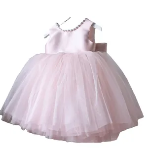 Pink satin baby girl formal dress with pearl collar and layered puffy tulle skirt