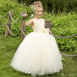 Elegant champagne girls floor-length princess dress with satin bodice and layered tulle skirt
