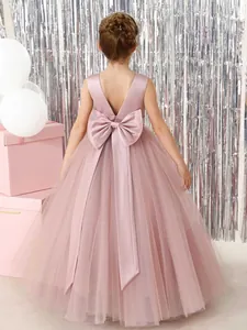 Ärmelloses rosa Mädchen-Abendkleid mit großer Satinschleife und vollem Tüllrock Rückseite