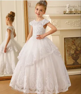 Exquisite white lace flower girl dress with layered tulle skirt and baroque embroidery