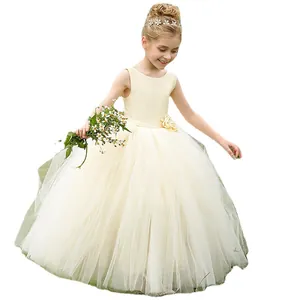 Elegant sleeveless cream tulle flower girl dress with floral waist accent for parties