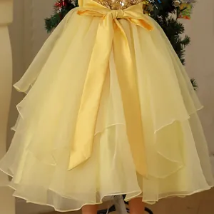 Elegant yellow sequin lace girl princess dress with a large satin bow on the back