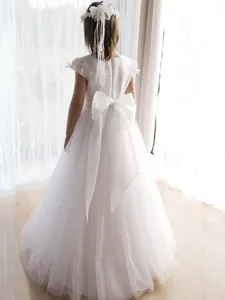 Robe de demoiselle d'honneur en dentelle avec grand nœud au dos et jupe en tulle multicouche