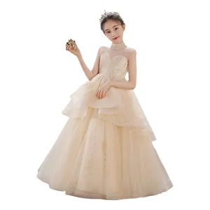 Robe de demoiselle d'honneur sans manches couleur crème avec jupon en tulle multicouche