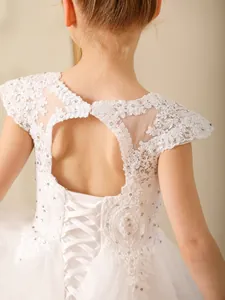 Elegant white lace flower girl dress with heart-shaped hollow back and satin lace-up ties