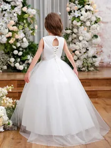 Abito da damina in raso e tulle con schiena intrecciata e ricami floreali