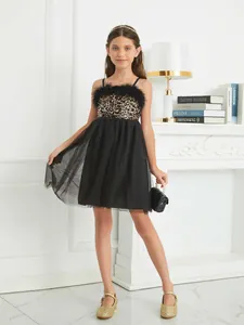 Elegant black sequin girls dress with feather trim and a voluminous tulle skirt