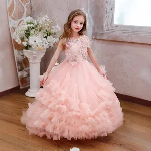 Detail showing layered pink tulle mesh and delicate 3D feather lace on the princess dress