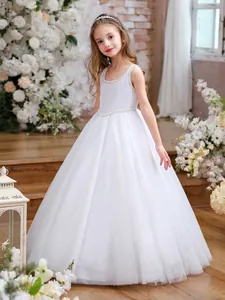 Elegant sleeveless white tulle flower girl dress with delicate pearl trim and glitter finish