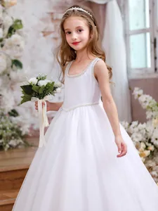 Elegant white sleeveless flower girl dress with pearl waist and layered tulle skirt