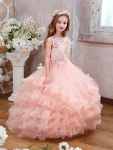 Elegant pink girl princess dress with floral lace embroidery and luxury tulle train