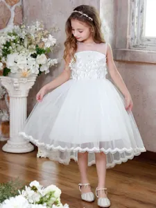 Sleeveless white lace flower girl dress with high-low tulle train for elegant ceremonies
