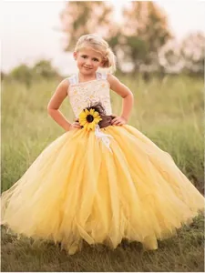 Flower girl dress in yellow tulle with sunflower belt and lace top for wedding party