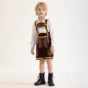 Detail of boys' Oktoberfest costume with brown velvet suspender shorts and gold embroidery