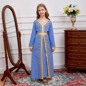 Detailed view of sky blue girl's kaftan with intricate golden embroidery on the bodice