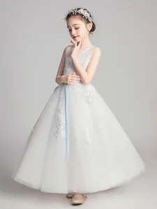 White sleeveless lace flower girl dress with a blue waist ribbon and mesh embroidery