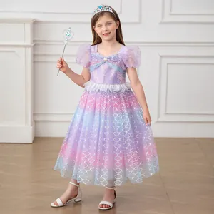 Detail of mermaid princess dress with sequined purple top and glittery fish scale pattern