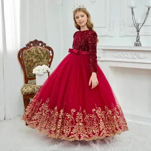Detail of red sequin bodice and tulle skirt with gold embroidery on kids princess dress