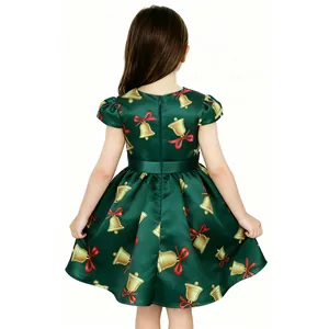 Back view of green Christmas dress for girls with gold bells and red bow prints