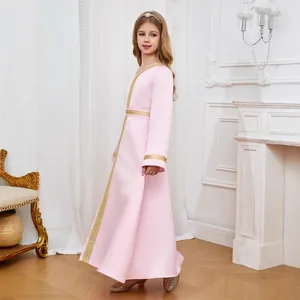 Detail of pink Arabic girl dress with golden lace embroidery and long sleeves