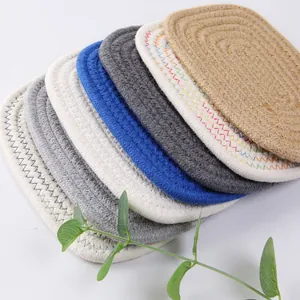 Sottobicchieri ovali in cotone intrecciati a mano in vari colori con cuciture decorative