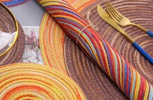 Close-up of colorful striped and brown woven placemats for dining table decoration