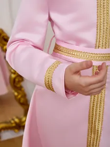 Pink satin Middle Eastern dress for girls with elegant gold lace trim and silky texture